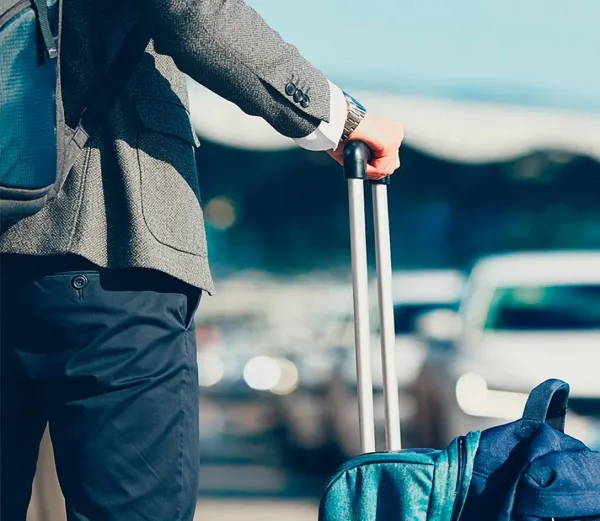 Professional chauffeur with luxury car in Nairobi